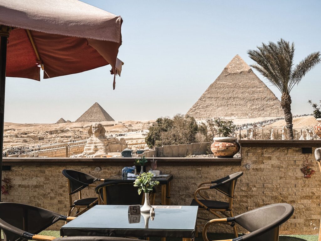Views from the Hotel's terrace in front of the great pyramid and sphinx during the day