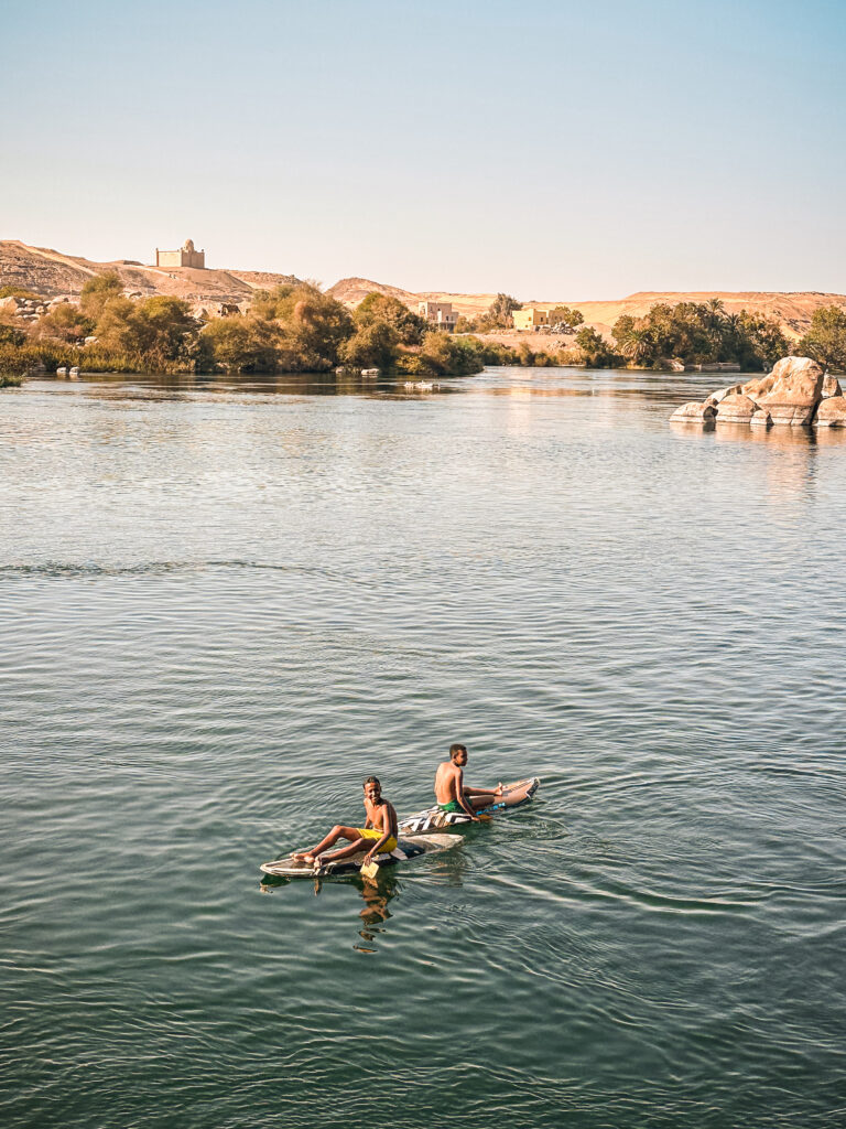 Children that paddle along the boats trying to get money in aswan