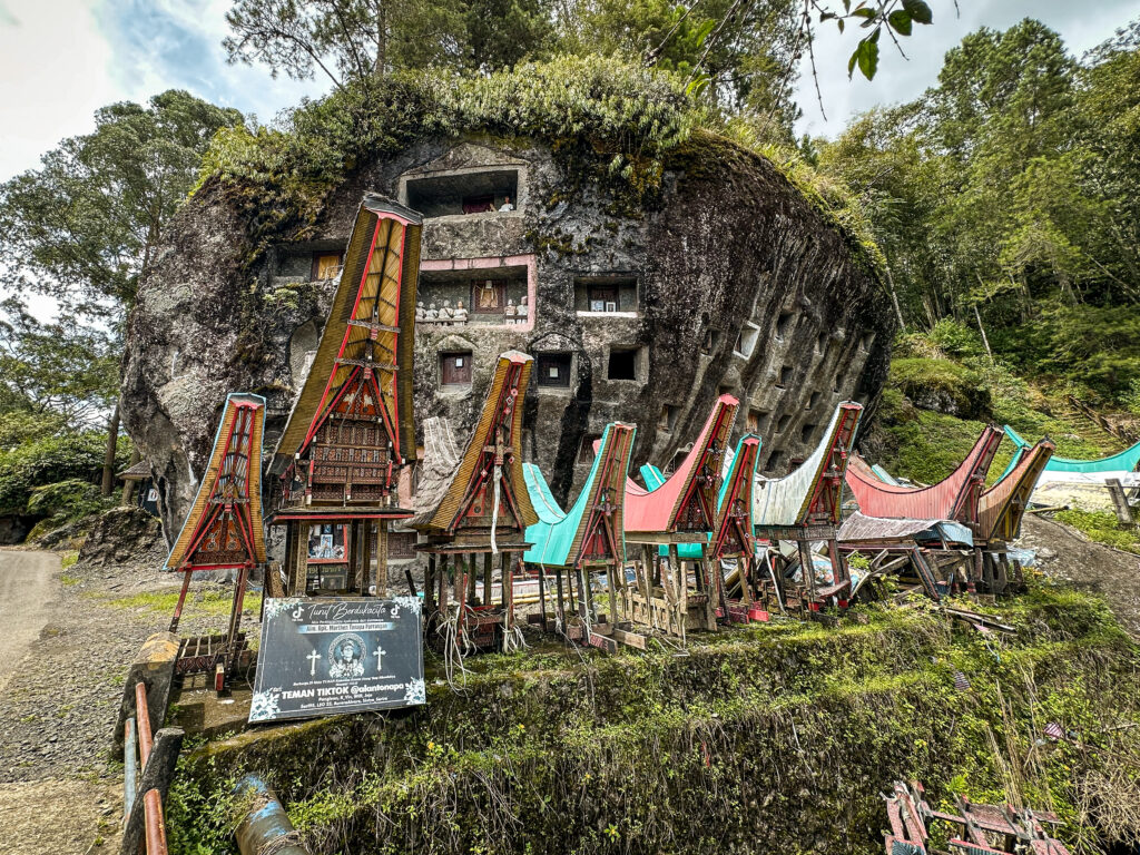 Tana Toraja traditional burial site in a rock, Sulawesi, Indonesia