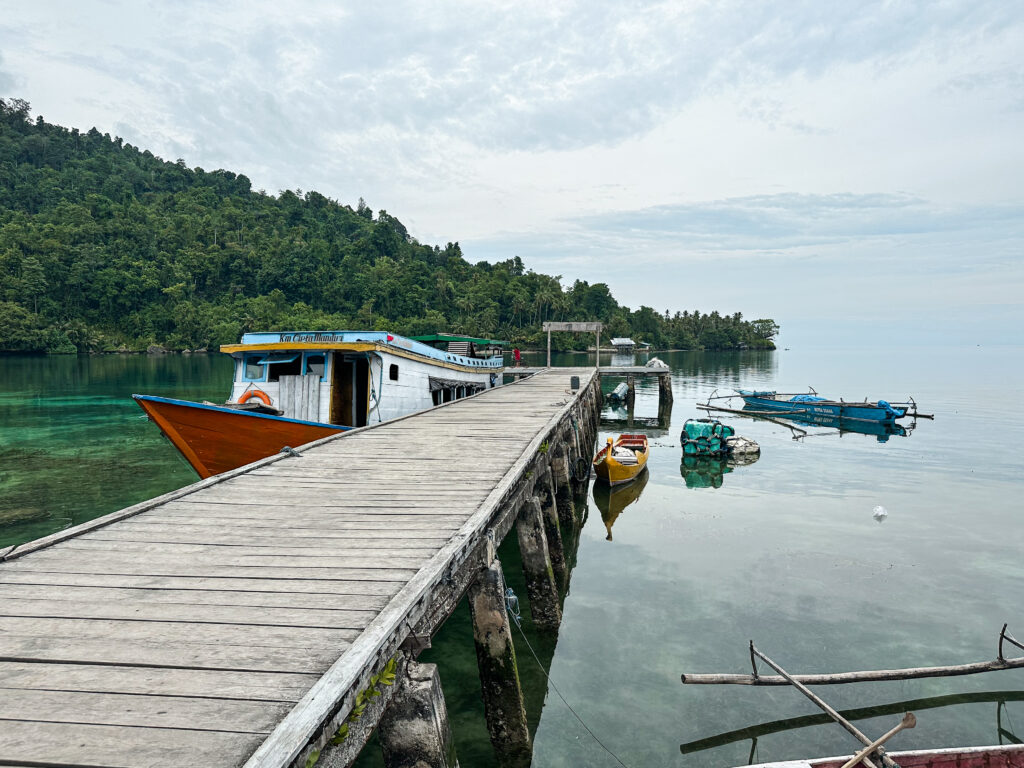 local Indonesian wooden boat at harbour, Peleng, Indonesia